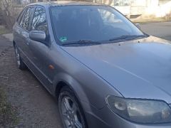 Фото авто Mazda 323