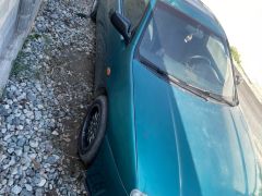 Сүрөт унаа Mazda 323