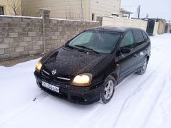 Photo of the vehicle Nissan Almera Tino