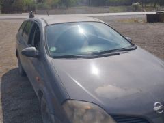 Фото авто Nissan Primera