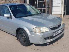 Фото авто Mazda Familia