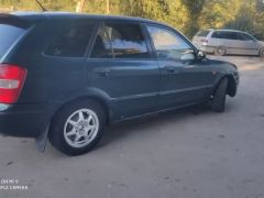 Фото авто Mazda 323