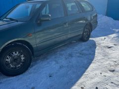 Photo of the vehicle Nissan Primera