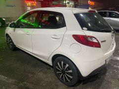 Photo of the vehicle Mazda Demio