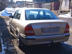 Photo of the vehicle Mazda 323