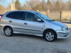 Photo of the vehicle Nissan Almera Tino