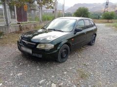 Сүрөт унаа Mazda 323