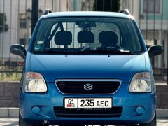 Photo of the vehicle Suzuki Wagon R+