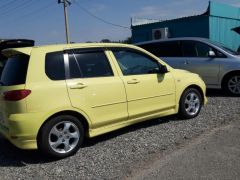 Photo of the vehicle Mazda Demio