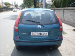 Photo of the vehicle Nissan Almera Tino