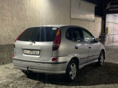 Photo of the vehicle Nissan Almera Tino