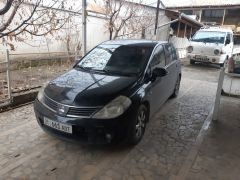 Фото авто Nissan Tiida