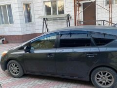 Фото авто Toyota Prius v (+)