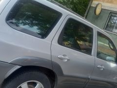 Photo of the vehicle Mazda Tribute