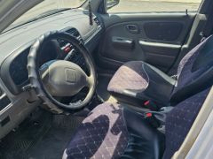 Сүрөт унаа Suzuki Alto