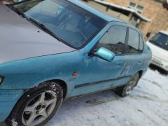 Photo of the vehicle Nissan Primera