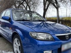 Фото авто Mazda 323