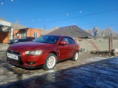 Фото авто Mitsubishi Lancer