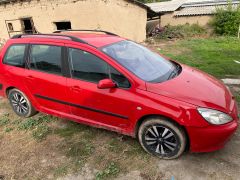 Photo of the vehicle Peugeot 307