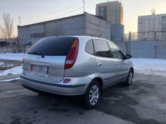 Фото авто Nissan Almera Tino