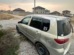 Photo of the vehicle Mazda Demio