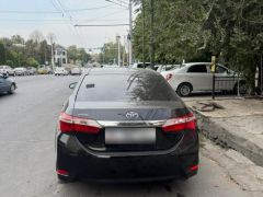 Photo of the vehicle Toyota Corolla