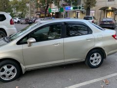 Фото авто Honda Fit Aria