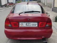 Сүрөт унаа Mitsubishi Carisma