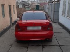 Сүрөт унаа Mitsubishi Carisma