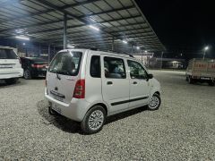 Photo of the vehicle Suzuki Wagon R+