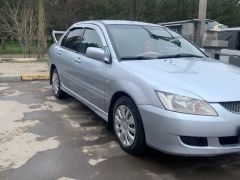 Фото авто Mitsubishi Lancer