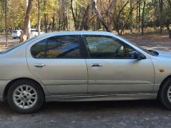 Photo of the vehicle Nissan Primera