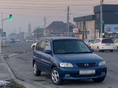 Фото авто Mazda Demio