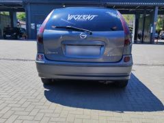 Фото авто Nissan Almera Tino