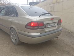 Фото авто Mazda 626