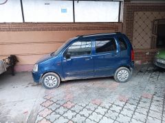 Фото авто Suzuki Wagon R+