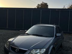 Photo of the vehicle Mazda 323