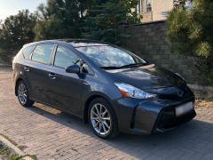 Фото авто Toyota Prius v (+)