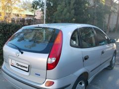 Photo of the vehicle Nissan Almera Tino