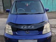 Сүрөт унаа Honda Capa