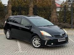 Фото авто Toyota Prius v (+)