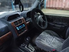 Сүрөт унаа Mitsubishi Pajero iO