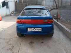 Фото авто Mazda 323