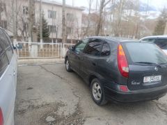 Фото авто Nissan Almera Tino