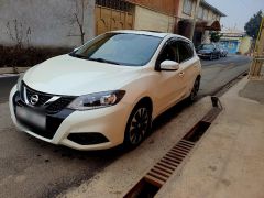 Photo of the vehicle Nissan Tiida