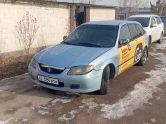 Сүрөт унаа Mazda 323