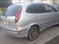 Photo of the vehicle Nissan Almera Tino