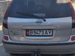 Фото авто Nissan Almera Tino