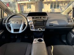 Photo of the vehicle Toyota Prius v (+)