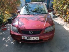 Сүрөт унаа Mazda 323